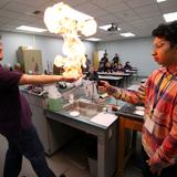 Western Nevada College Photo - Brian Sandoval, 18, helps Physics professor Tom Herring with a demonstration during College Day at Western Nevada College on March 10, 2017, in Carson City.