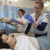 University of Pittsburgh-Titusville Photo #2 - Nursing students working in simulation lab.