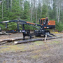 Paul Smiths College of Arts and Science Photo #4 - Foresty Department:Our experiential learning is sure to assist our forestry department in bettering their skills and having real-life experience for the next stage of life. Here you see them using a log-loader to enhance their skills in the field.